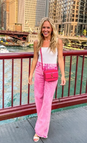 Pink wide leg jeans featuring a high waist, perfect for casual outings or summer gatherings.