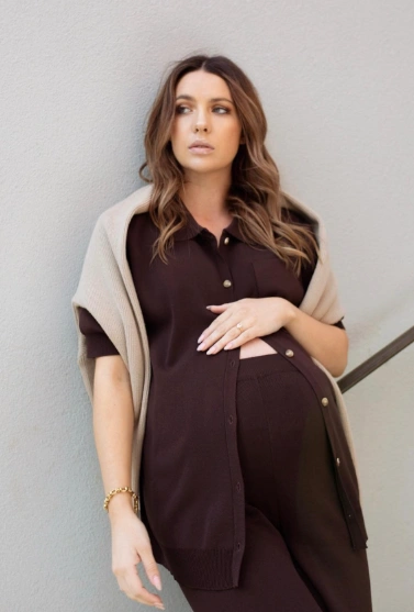 Maternity sweater set in rich brown, featuring short sleeves and a button-up cardigan, perfect for casual outings.