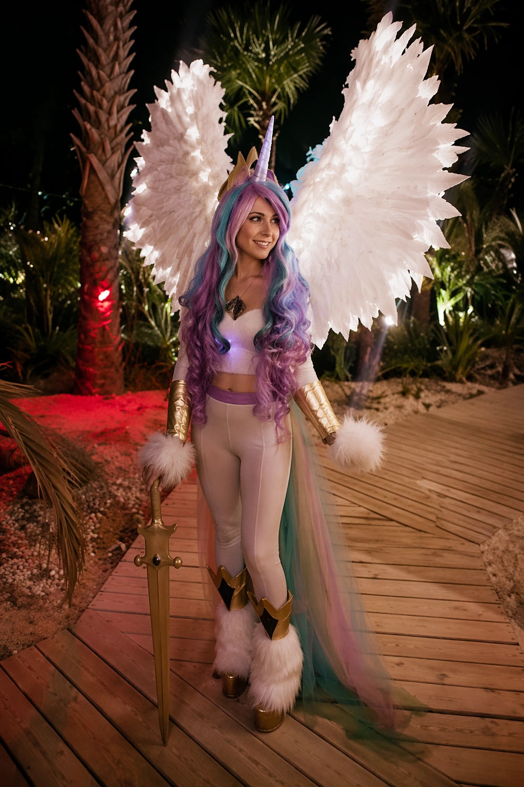 Woman in pastel unicorn costume with lavender hair, white feather wings, gold accents, and sword on wooden path.